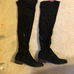 Above the knee black boots